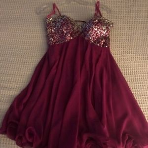 Magenta knee length Beaded strapless dress